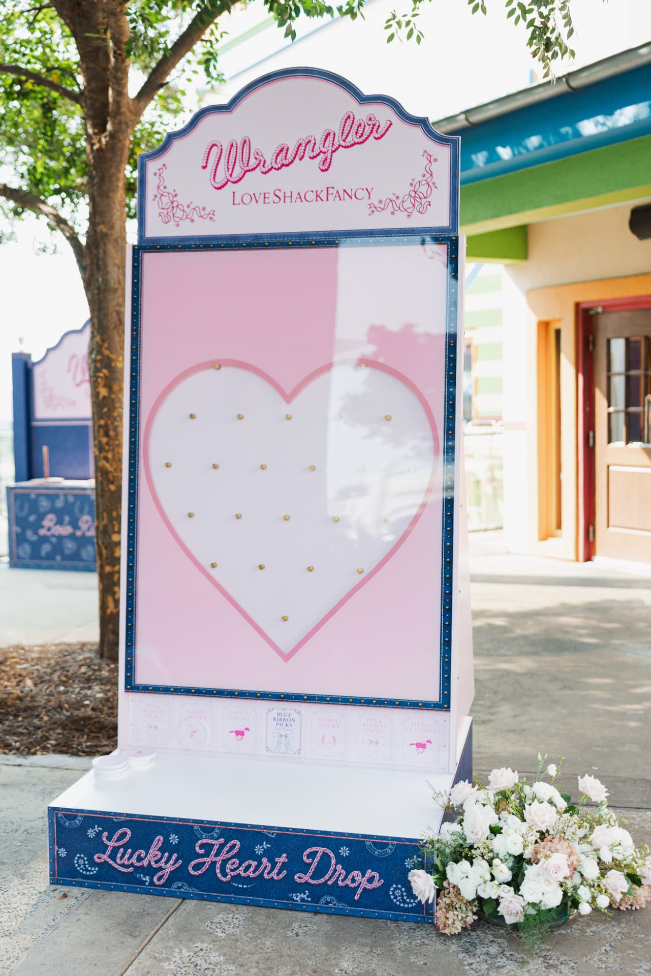 Guests inside the LoveShackFancy shop at the grand opening